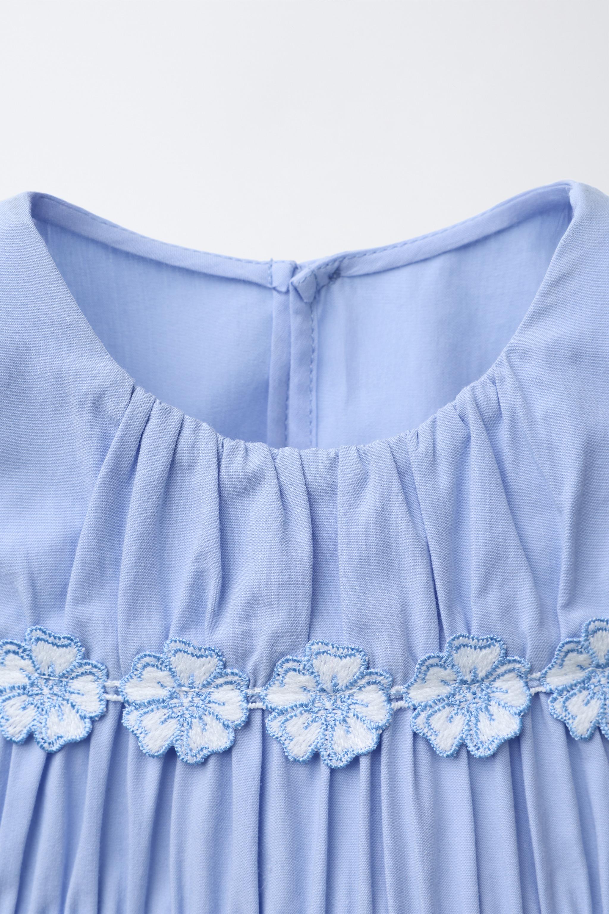 BLOUSE PLISÉE À FLEURS